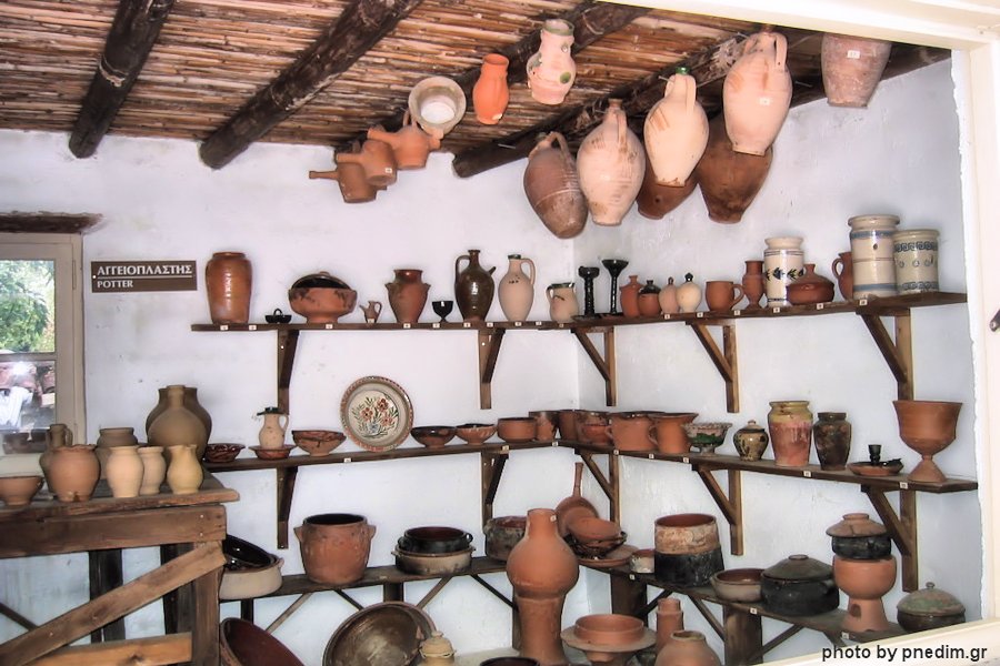 Shelves of ceramic vessels in the museum pottery display